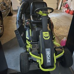 Ryobi 80V HP Brushless 46-inch Electric Riding Lawn Tractor, model RM480ex.