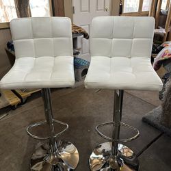 2 White Swivel Bar Stools