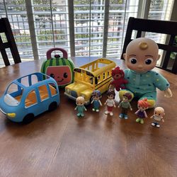 Cocomelon Singing Doll, Family Car, Bus and Character Playsets