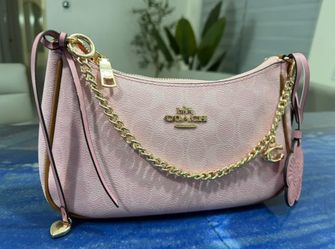 Coach Floral teri powder bag