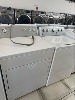 Kenmore top load washer and electric dryer set