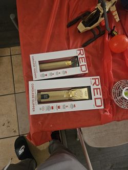 Red Clippers And Beard Trimmer