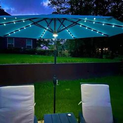 Patio Umbrella New in Original Packaging With LED Lights and Hub Light 10 Ft Retailed For $177.29.