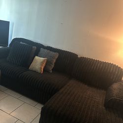 Living room couch with all pillows