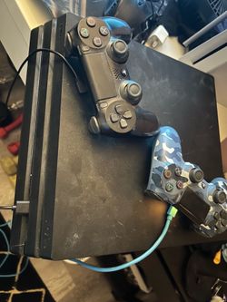 PS4 Pro with controllers