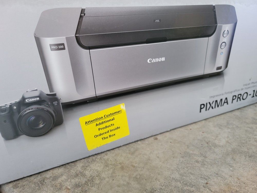 Canon Pixma Pro-100 Color Professional Inkjet Printer Bundle included ink and photo paper plus.