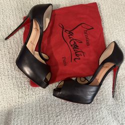 CHRISTIAN LOUBOUTIN