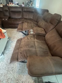 Recliner with power button
