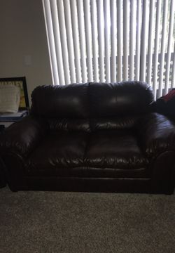 2 seater brown leather couch