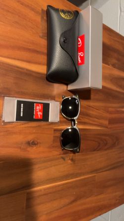 Black and gold ray ban glasses