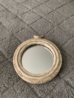 Distressed metal framed mirror with bird on top 8.25”
