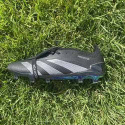 Black predator cleats
