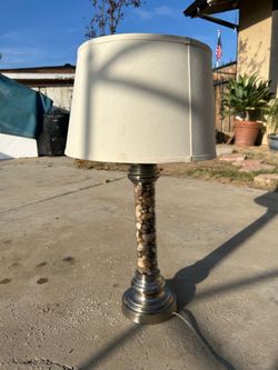 Grey rock style table lamp 27 inches