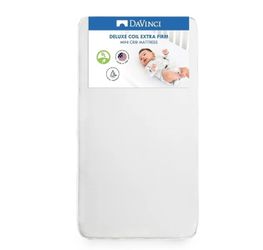 DaVinci Deluxe Coil Waterproof MINI Crib Mattress in White, Firm Support, Lightweight, Greenguard Gold Certified