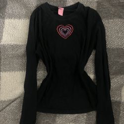 black long-sleeve baby tee with a rhinestone heart decal