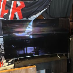 Samsung 55’ Curved Screen TV