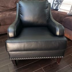 Black faux-leather accent chair