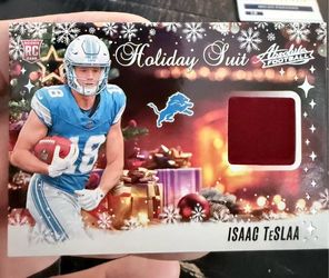 2025 Absolute Football Holiday Suit Rookie Materials card of Isaac TeSlaa