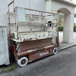 WILDCAT Scissor Lift.  For Parts Or Scrap Metal