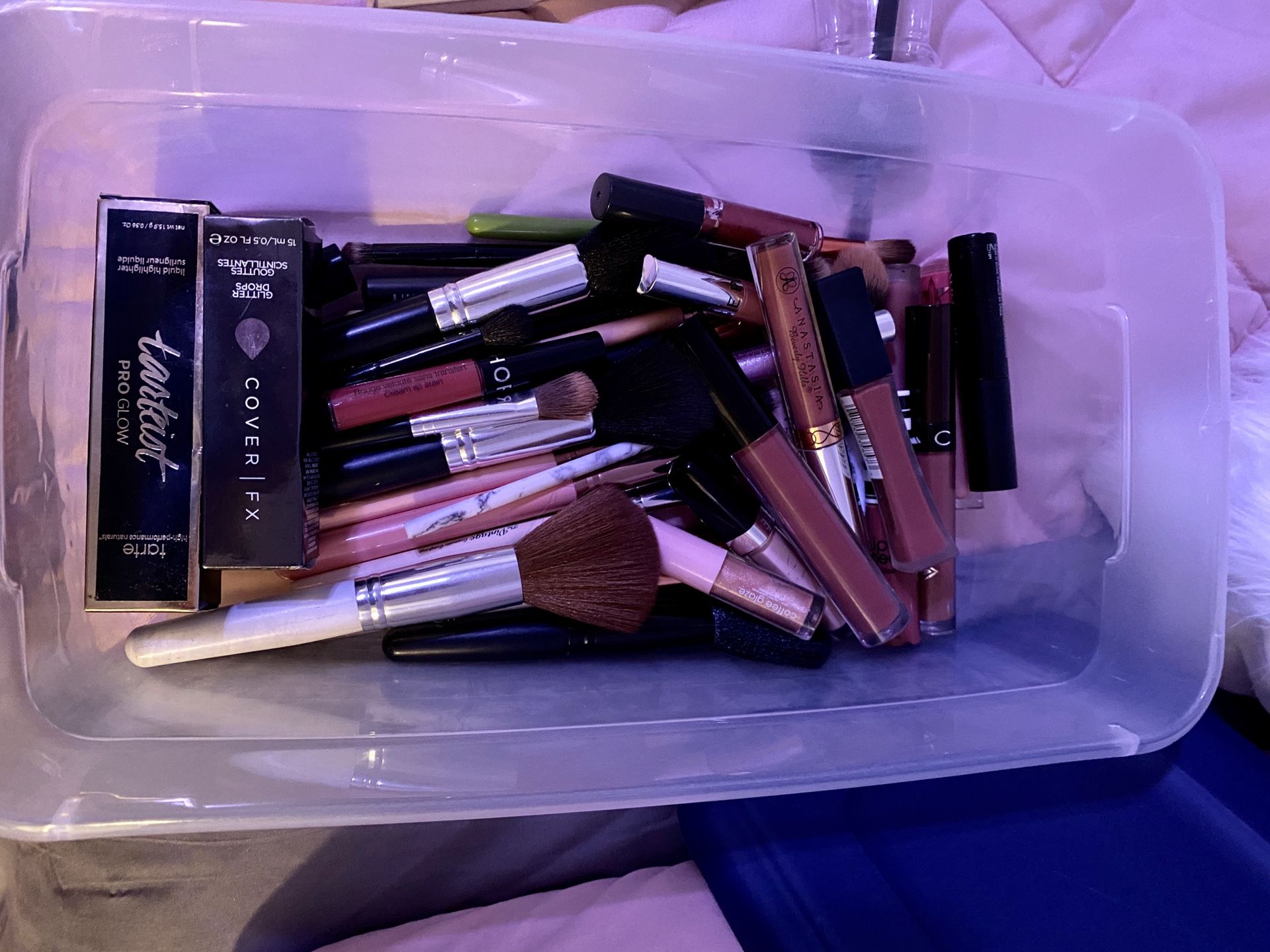 Makeup, brushes, lipsticks, highlighters