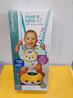 Infantino 2-in-1 Music & Lights Doorway Jumper featuring a motion-activated fox toy and an adjustable, machine-washable seat
