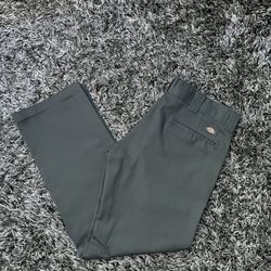 Dickies Slim Straight Original work pants in a charcoal gray color.