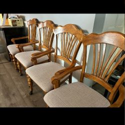 4 Armed Upholstered Wooden Chairs With Rollers 