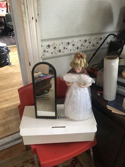 Doll an mirror