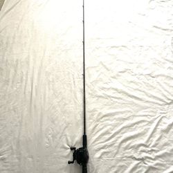 Like New 5.6ft Medium Action Daiwa Fishing Rod With Medium Action All Pro bait, caster fishing reel