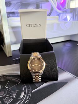 Citizen Rolan Eco‑Drive two‑tone brown dial watch