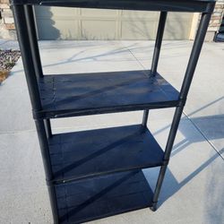 shelving unit
4-tier
plastic
can be disassembled
27x15x52H"
clean
