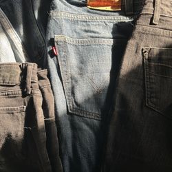 Used Levi, Calvin Klein And Others  Men And Woman Will Sell The Entire Bag Of About 20+ Pants