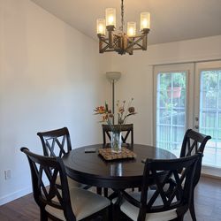 Dinning set extendable 5 chairs (round 4ft and oval extended 6ft)