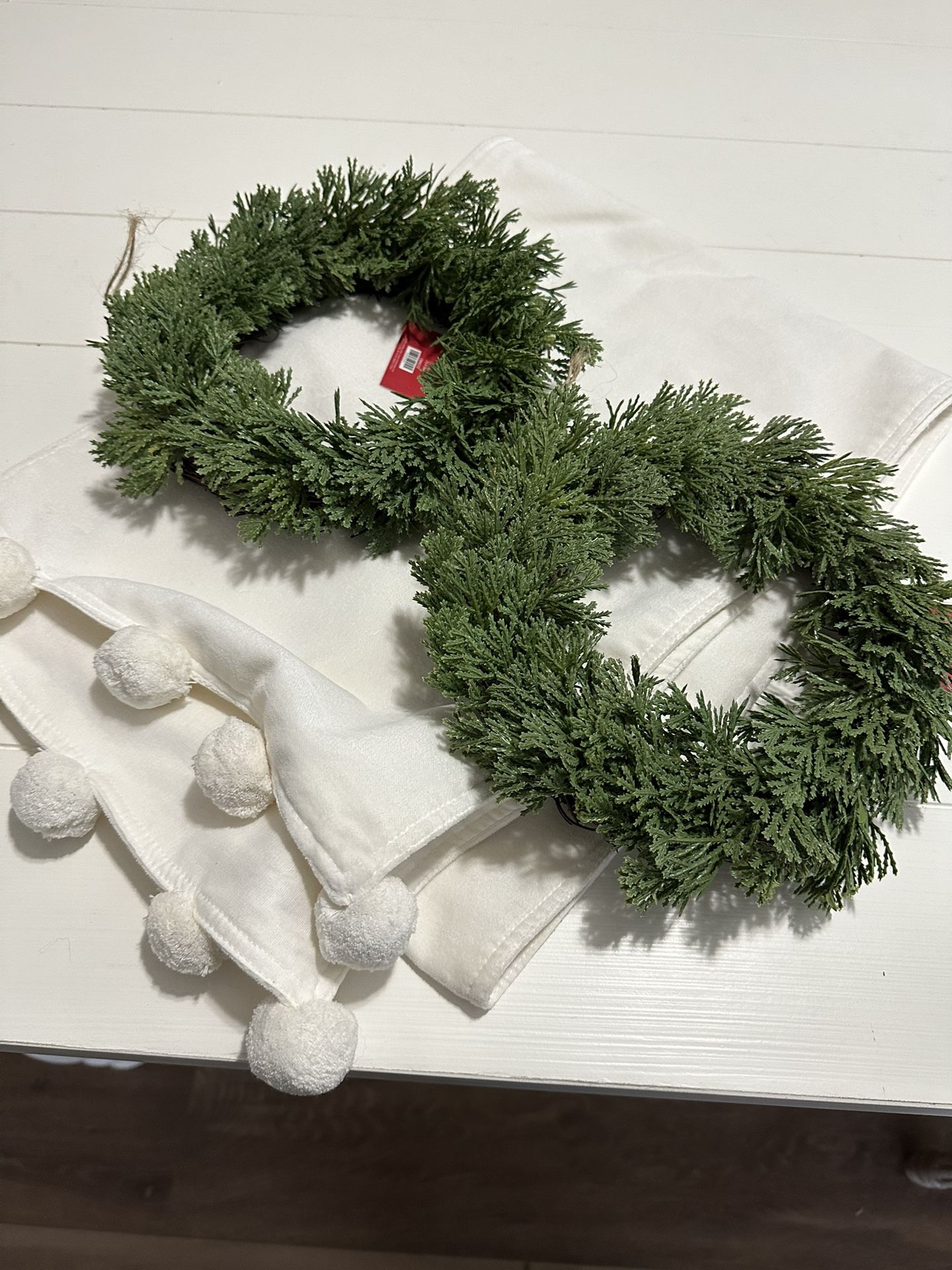 Two Cedar Wreaths And Velvet Pom Pom Table Runner
