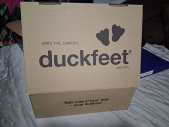 Brand new never worn duck feet boots