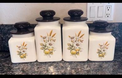 This vintage 4-piece ceramic kitchen canister set