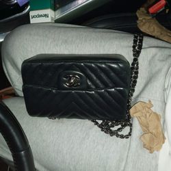  Chanel Classic Flap bag with a chain strap. 
