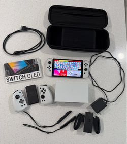 Nintendo Switch OLED White Edition Bundle + NYXI Controllers + Case + 128GB
