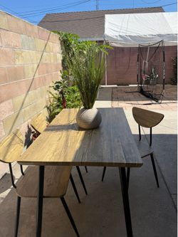 Table with 3 chairs.