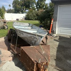 Game fisher 14’ Fishing Boat With trailer.