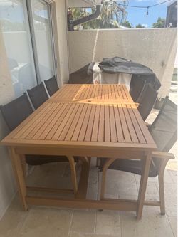 Outdoor eucalyptus wood patio set with six chairs Outdoor eucalyptus wood patio set with six chairs