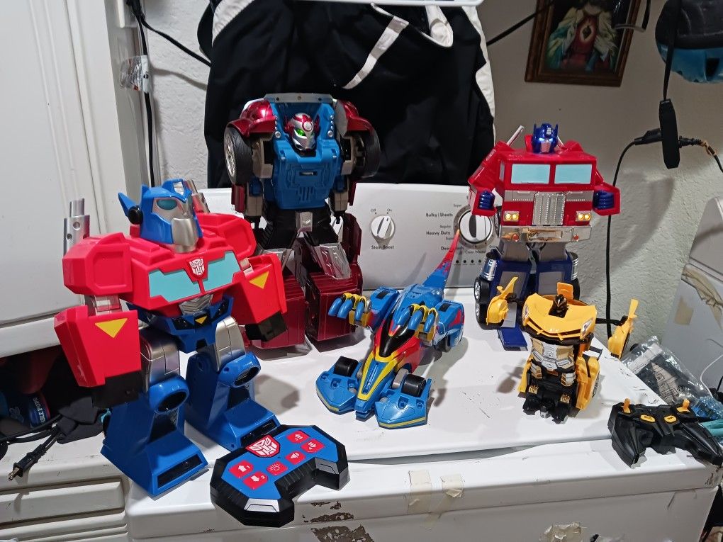 Selling These transformers for 150.

1- D.I.C.E. DNA integrated cybernetic Enterprises KNIGHT REX Bandai Transforming car. No remote.
2- Yellow Donald