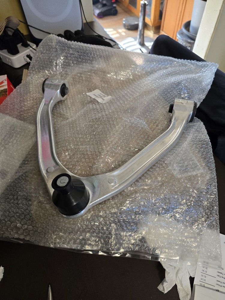 Upper Control Arm Left Side Control alarm with bushings and ball joint