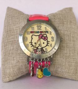 Cute Vintage Y2K pink Sanrio Hello Kitty watch with dangling charms