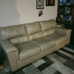Queen Sized Sofa Bed. Beige Leather 