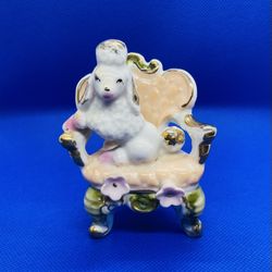 Antique Porcelain Poodle Figure Sitting On A Chair
