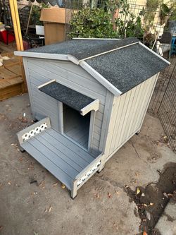 Medium sized wooden dog house