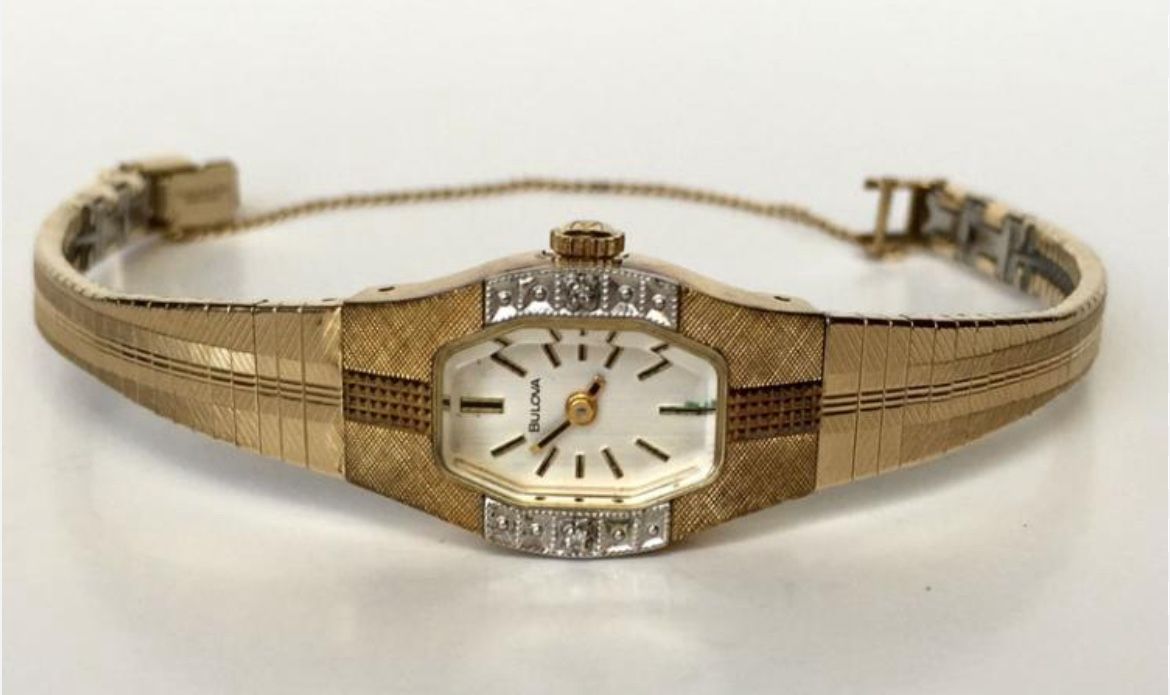 Vintage ladies two tone BULOVA diamond watch with original bracelet. On the top of case 2 diamonds from sides. Crystal measured 15 mm x 10 mm, depth 8