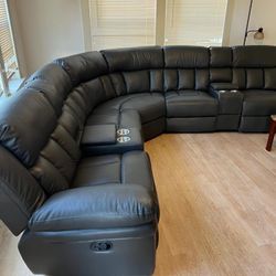 New Reclining Sectional .  Grey Gel Leatherette .  123” X 123”.  Free Delivery !