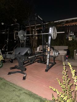 OLYMPIC SQUAT RACK WITH OLYMPIC WEIGHTS AND BENCH
